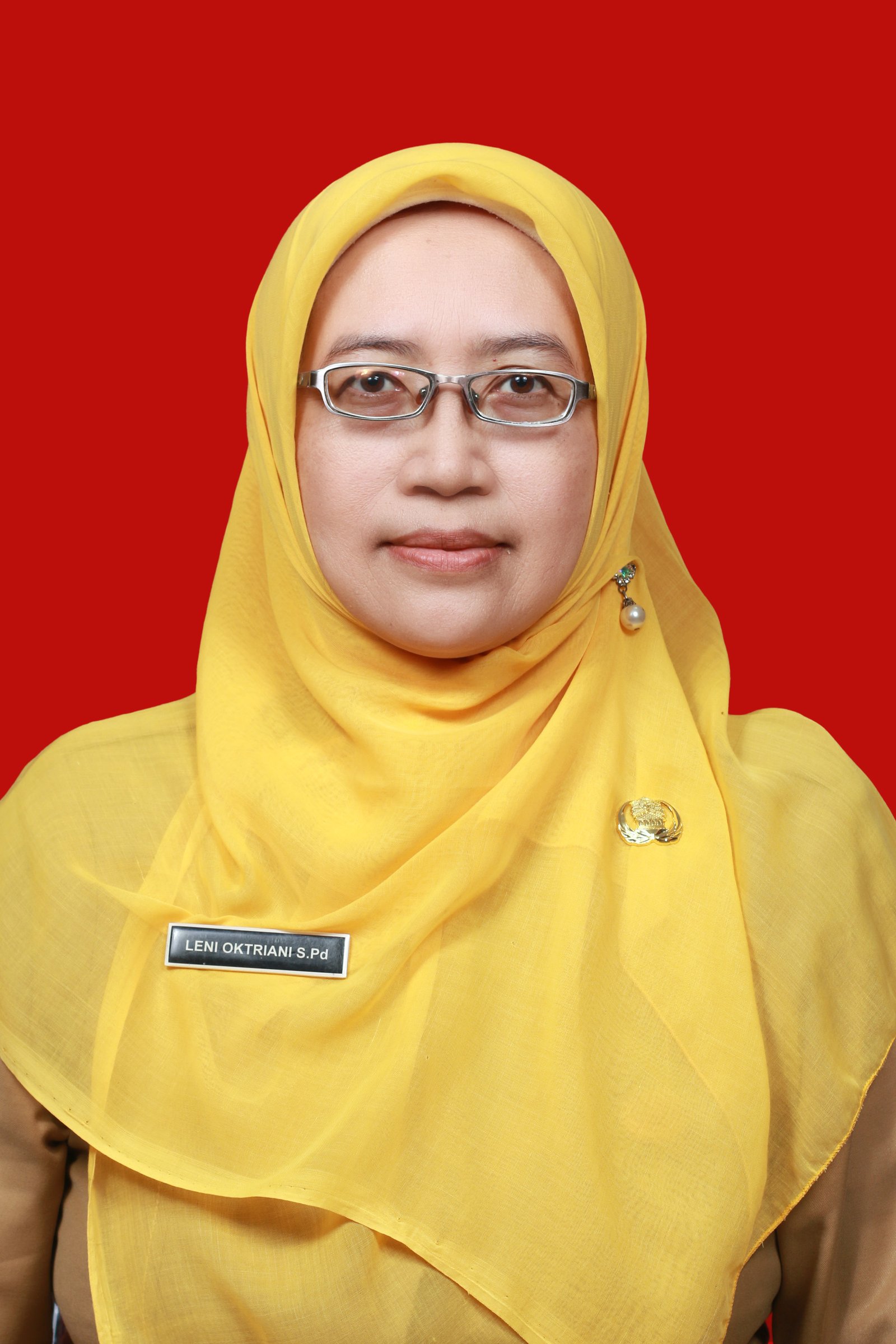 Leni Oktriani, S.Pd